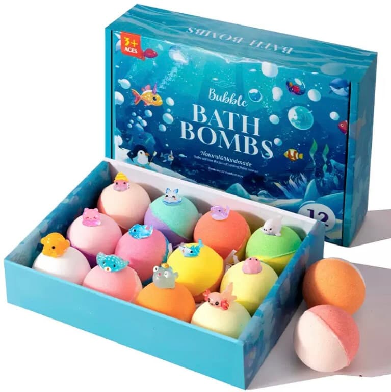 SplashBombs 12-pack open box with rainbow bath bombs and ocean toys